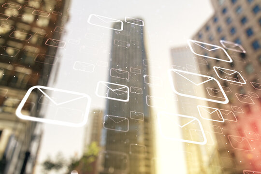 Abstract virtual postal envelopes hologram on modern architecture background, email and notification concept. Multiexposure