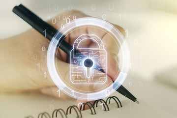 Creative lock illustration with microcircuit and man hand writing in diary on background, cyber security concept. Multiexposure