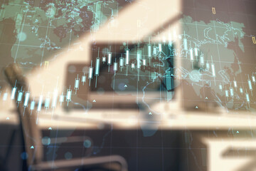 Multi exposure of abstract financial diagram with world map and modern desk with computer on background, banking and accounting concept