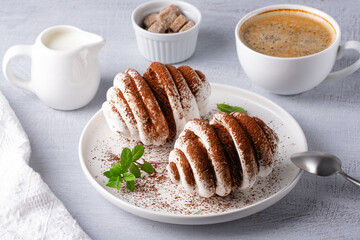 Meringue Cookies with chocolate and cup of coffee