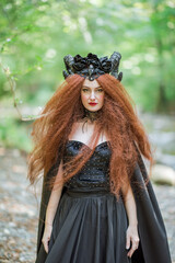 red-haired girl dressed in gothic style