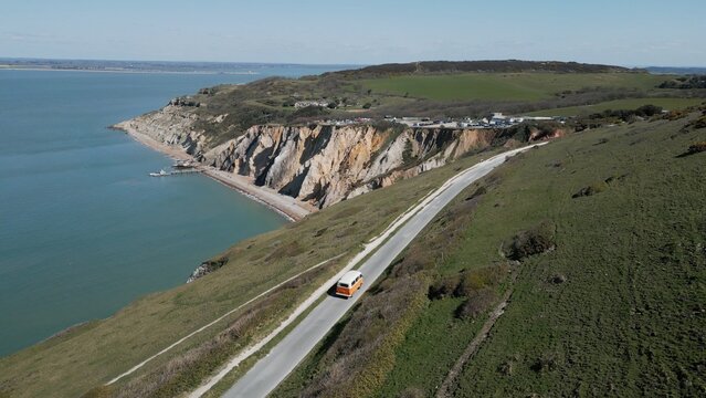 view from the beach with orange campe rvan 