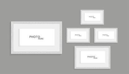 Set of grey wooden pattern of photo frames on isolated dark wall, uded in photo mock up vector illustration