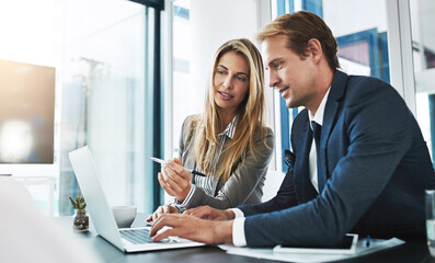 Man, woman and partnership with research, laptop and typing with help, explain and coaching in...