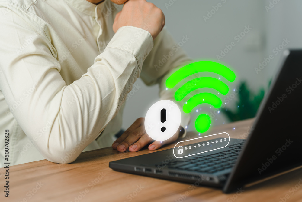 Poster User man using a computer laptop to connect to wifi but wifi not connected or password is incorrect and waiting to loading digital data form website, concept technology of waiting for connect to wifi.