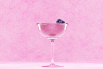Glass of pink cocktail decorated with blue blackberry at pastel background. Summer concept. Relax.