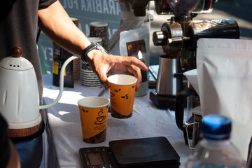 a barista is making coffee in the pantry