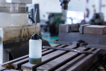 Sewing machine oil bottle for home and high professional sewing machine in factory or industrial plant.