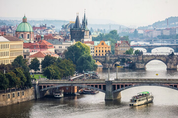 Fototapeta na wymiar A view of old town Prague with the Vltava river and multiple bridges, Czech Republic