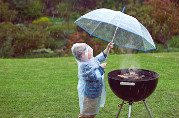 Weather, nature and boy with a grill, rain and wellness with safety, cover and winter outfit. Bbq,...