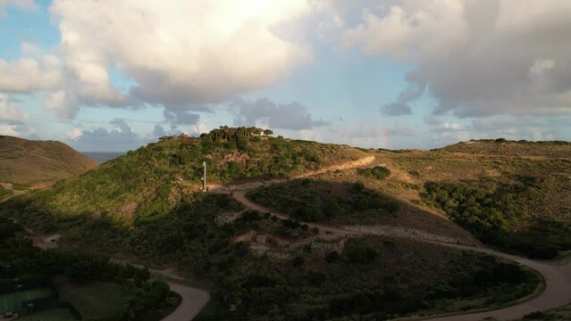 Aerial View of Hills and Roads on British Virgin Islands With Rainbow Above Sea Horizon, Drone Shot