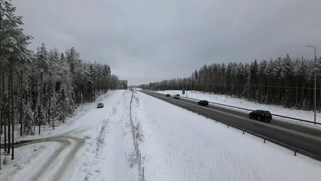 Typical winter motorway national road in Finland, close aerial view