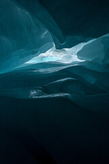 deep blue ice structure in a swiss ice cave in the Valais Alps - obrazy, fototapety, plakaty