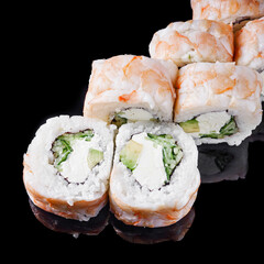sushi roll with shrimp Ebby cream cheese Philadelphia avocado cucumber on a black mirror background