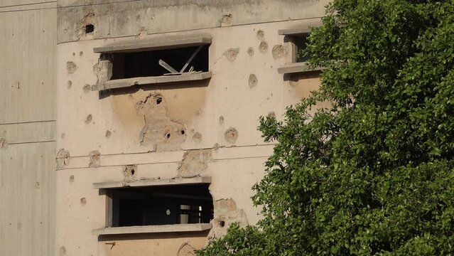 Damaged building with bullet holes in Varosha, a once thriving vacation and resort destination in Famagusta, Cyprus
