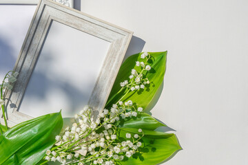 lilies of the valley and frames on white
