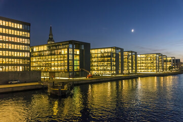 Fototapeta na wymiar Financial district at night in Copenhagen, Denmark