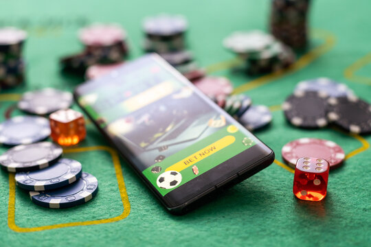 smartphone sports betting casino on the background.