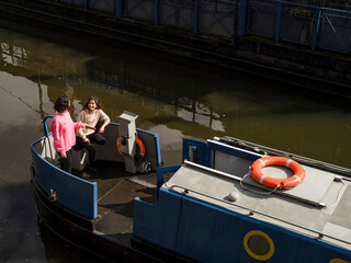 High angle view of women on boat in canal