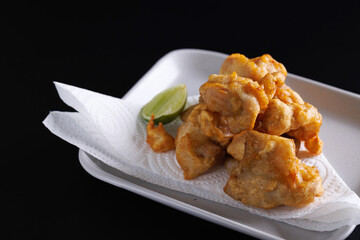 Chicken Karaage Japanese Fried chicken isolated in black background