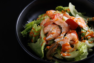Japanese salad isolated in black background