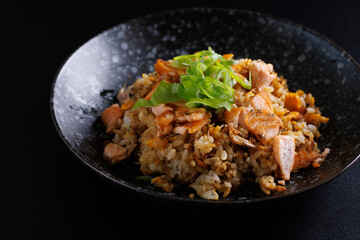 Japanese fried rice yakimeshi isolated in black background