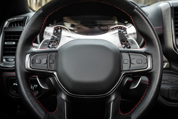 car Interior - steering wheel, shift lever and dashboard, climate control, speedometer, display