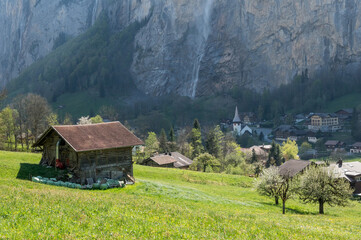 view of Staubbachfall in Lauterbrunnen on a beautiful sunny spring day in the Bernese Alps