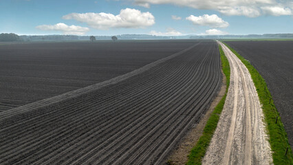Fototapeta na wymiar Uffelte Netherlands. Aerial view at fields of Uffelter es. Just ploughed fields. Spring.