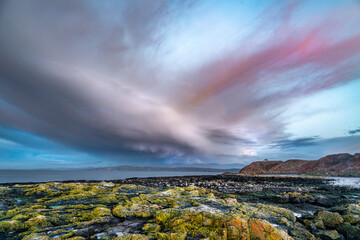 Dramatic windy cloud scene during sunset over Wales