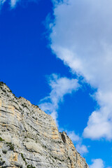 Mountains with blue sky in the background with space for text.

