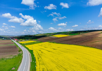 Obraz premium The shadow of the clouds over a cultivated field in the countryside