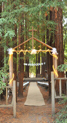 Outdoor chapel in the California Redwoods set up for a wedding day.

