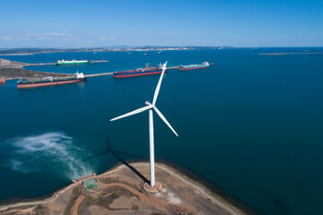 Wind turbines on the shore in Mediterranean sea