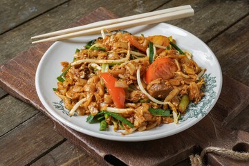 Asian food fried noodles "Char Kuey Tiaw" or "Kuey Tiew Goreng"