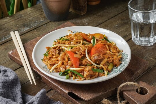 Asian food fried noodles "Char Kuey Tiaw" or "Kuey Tiew Goreng"