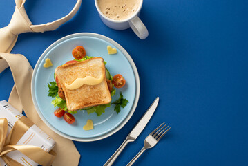Give Dad the gift of a morning he'll cherish with a Father's Day breakfast surprise! Behold a top view of a toast, mustache-shaped cheese, coffee, trendy accessories on blue background with text space