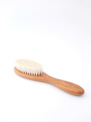 Hair brush isolated on white background. Baby hair brush that is soft and safe to use on baby's head