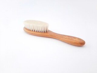 Hair brush isolated on white background. Baby hair brush that is soft and safe to use on baby's head