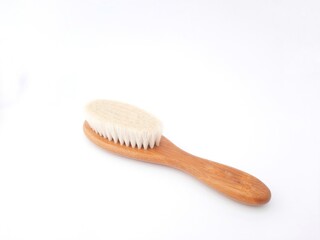 Hair brush isolated on white background. Baby hair brush that is soft and safe to use on baby's head