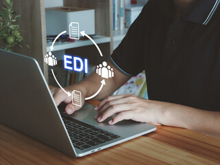 Electronic data exchange EDI. Man with crates exchanging data between teams, team collaboration.