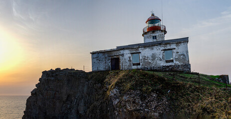 Fototapeta na wymiar lighthouse on the hill