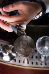 Bar and bartenders making coctails, closeup details