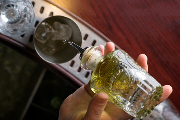 Bar and bartenders making coctails, closeup details