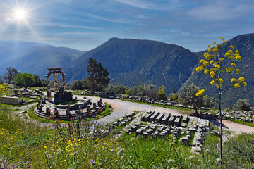 panoramic view to the Tholos of Delphi, a circular temple and one of the ancient structures of the Sanctuary of Athena Pronaia, Delphi, Greece
