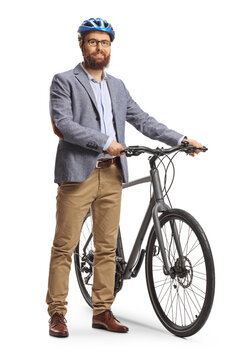Bearded man with helmet standing next to a bicycle and smiling