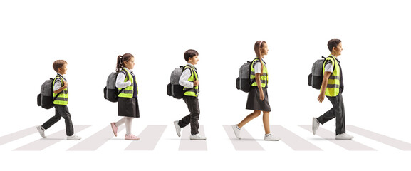 Children with safety vests crossing street in a line