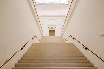 Fototapeten Amsterdam, Netherlands - March 30, 2023: Classic marble stairs at the Stedelijk Museum in Amsterdam  © Torval Mork