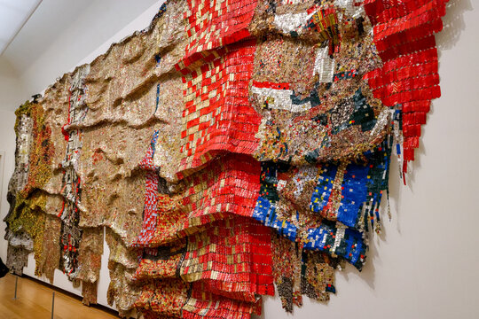 Amsterdam, Netherlands - March 30, 2023: 'In the World But Don&rsquo;t Know the World', 2009, El Anatsui on display in the Stedelijk Museum in Amsterdam
