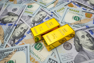 gold bars on dollars.